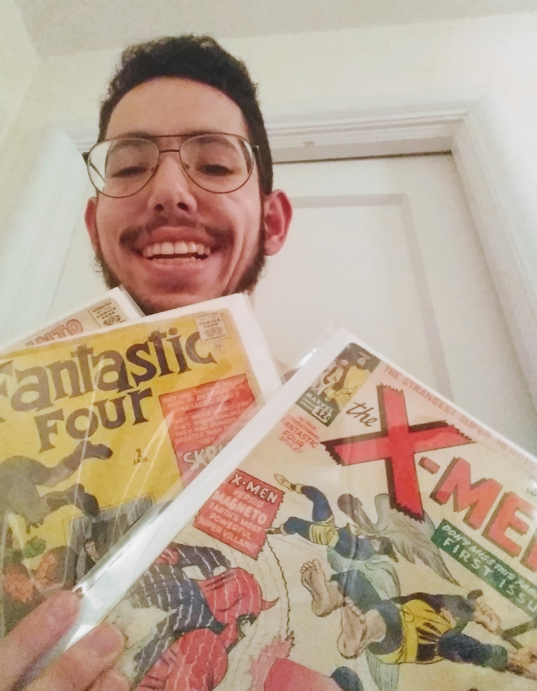 Dylan Holding 1960s Marvel Comics